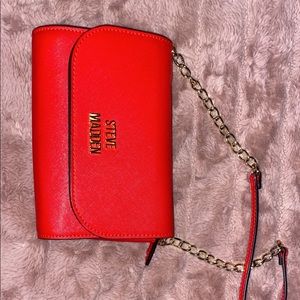 Red Steve Madden crossbody bag